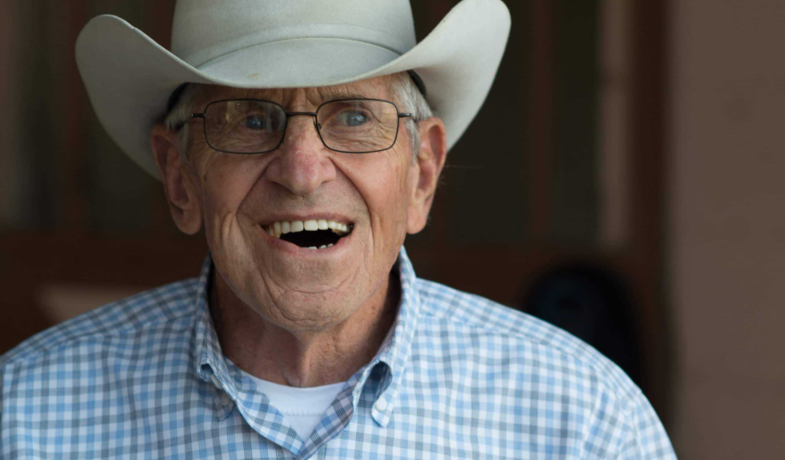 Don Harden, a seasoned cowboy hat-wearing man with glasses, is an expert in Precision Ag technology.