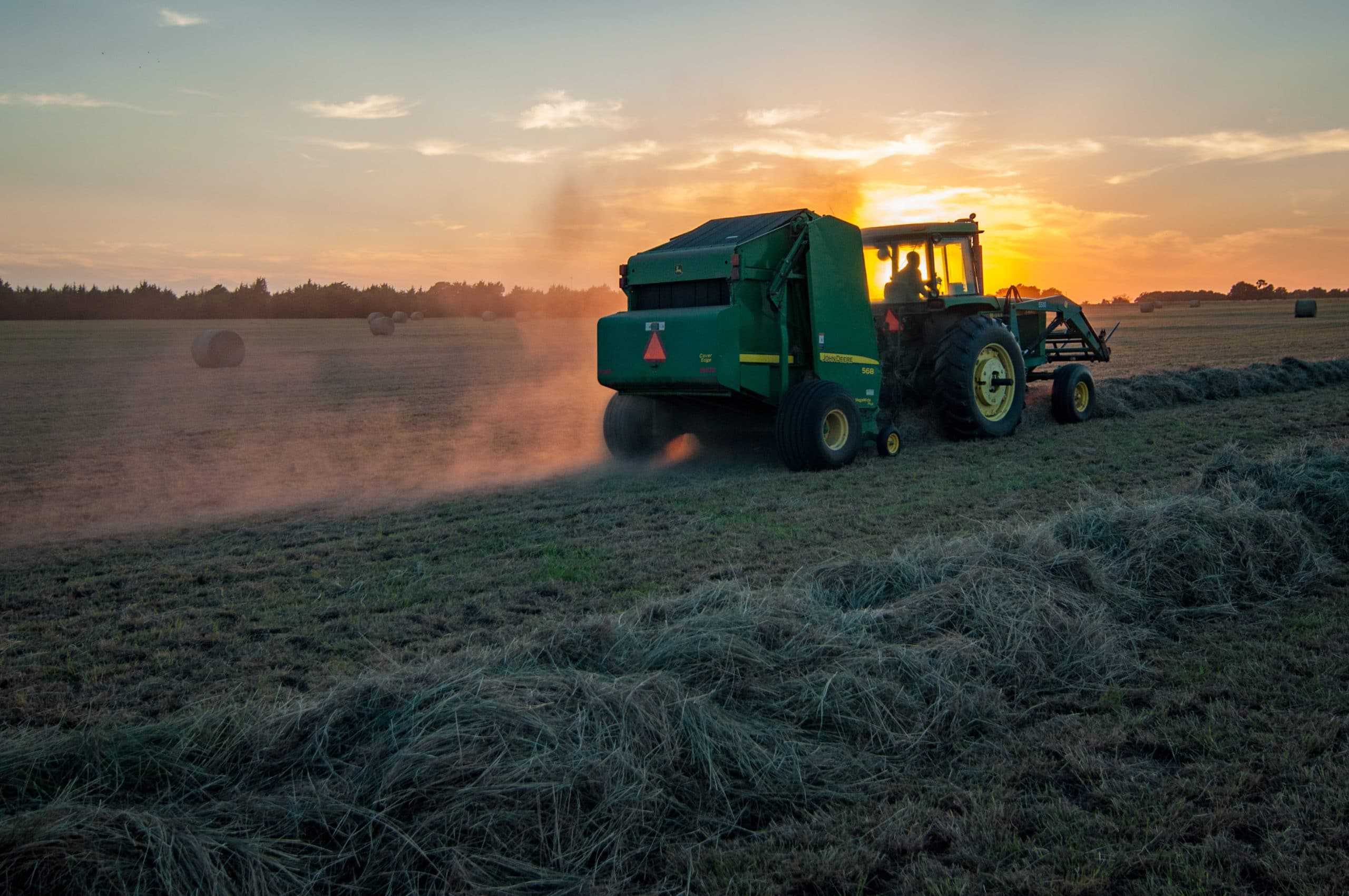 A john deere tractor in an Agriculture field.
